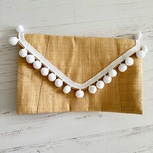 Tan Clutch with White Pom-Pom Trim